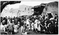 Armenian refugees in Van crowding around a public oven in 1915.