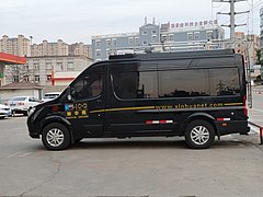 Xinhua vehicle at a parking lot.jpg