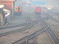 a special railway vehicle (on the left), besides a shunting locomotive (on the right)