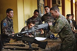 NZ infantryman disassembles an FN MAG during Exercise Croix du Sud.jpg