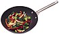 Black_pan_with_stir-fried_vegetables_(broccoli,_onion,_red_pepper)