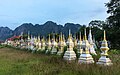 105 White and golden graves in a Buddhist cemetery at sunrise in Vang Vieng, Laos uploaded by Basile Morin, nominated by Basile Morin,  7,  1,  0