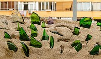 Rank: 40 Green glass bottle shards on a wall at the museum Fundació Pilar i Joan Miró in Mallorca