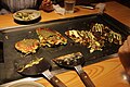 Half-made Okonomiyaki 調理中のお好み焼き