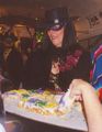 Serving the king cake, New Orleans Carnival party, United States