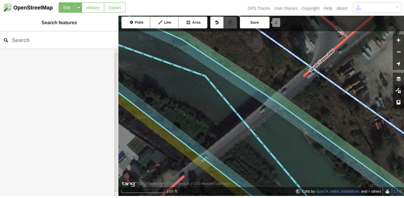 Map representation of a road intersecting a water flow.